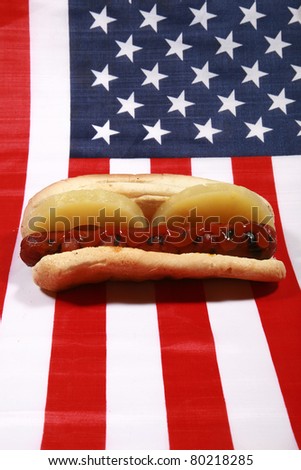 Hot Dog! A pipping hot Hot Dog in a bun with Pineapple Slices on an american flag. The perfect image for all your Hot Dog photo needs.