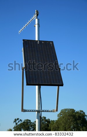 solar panels produce electricity for a transmitting beacon at a remote location where other forms of electricity do not exist