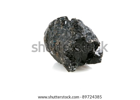 volcanic glass (rock) black obsidian isolated on white with room for your text