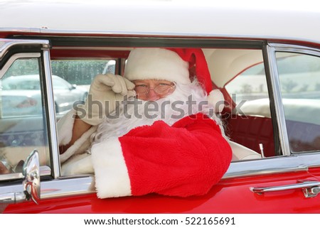 Santa Claus drives his Hot Rod Car. Santa Drives his car. Santa Claus arrives in style. Santa Cruises in his Classic Car. Santa Claus Drives. Santa Claus Car. Santa Car.