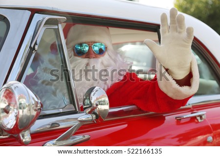 Santa Claus drives his Hot Rod Car. Santa Drives his car. Santa Claus arrives in style. Santa Cruises in his Classic Car. Santa Claus Drives. Santa Claus Car. Santa Car.