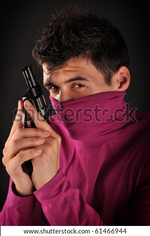 handsome guy with a gun
