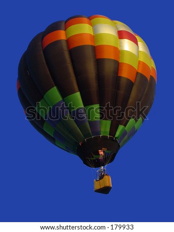 Hot air balloons taking off after sunrise.