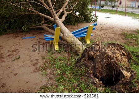 Damage by hurricane Katrina:A tree fell onto a playground bench, Thursday, Aug. 25, 2005, in Miami Florida.