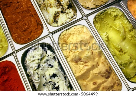 Ice cream parlor. Nine ice cream of different colors. Popular ice cream flavors for your taste.