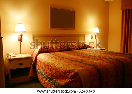 Hotel room - orange glow - fill in your wall art or logo.