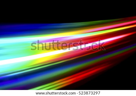 Light being refracted from the surface of a DVD