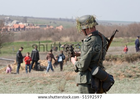 ODESSA - APRIL 11: reconstruction of battle for the liberation of Odessa. Soldiers dressed in the form of World War II, competed in the attack on April 11, 2010 in Odessa, Ukraine.