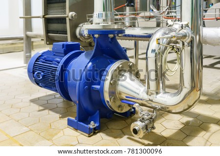 Water Centrifugal pump and motor line with pipe rack in power plant construction site industrial, demineralized water