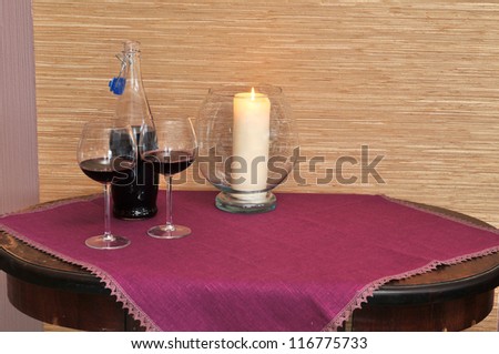 Table with candle and wine