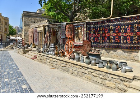 AZERBAIJAN, BAKU, JUNE 16, 2014: Icheri Sheher (Old Town) of Baku, Azerbaijan. Typical tourist shop with souvenirs and antiques.