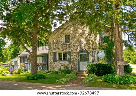 Rural house with leafy trees
