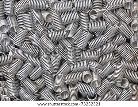 A large collection of stainless steel springs