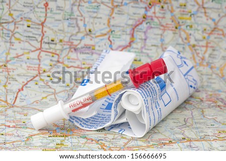 Alcohol breathalyzer on a French map
