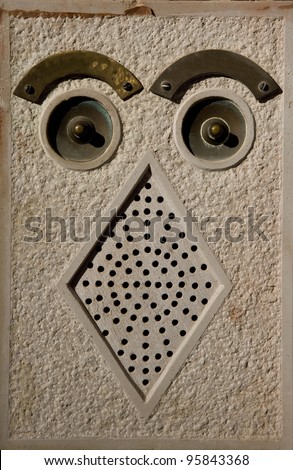 Door bell abstract looking like an owl