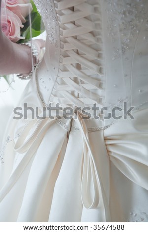 CloseUp Image Of The Detailed Laces On The Back Of A Wedding Dress Stock 