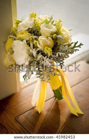 Image of a beautiful floral bouquet on wood table