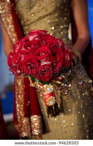 Image of a beautiful Indian bride\'s bouquet during wedding