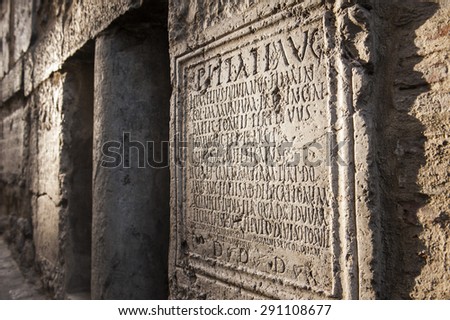 Stone tablets written in Latin.