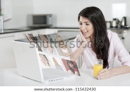 Girl using laptop at home to chat with friends, displaying a concept of her friends profiles.
