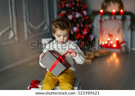 Child with presents for Christmas