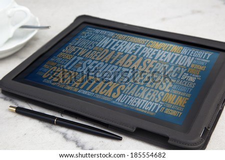 tablet with it security word cloud