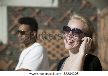 she is happy on the phone while he gets angry 3847