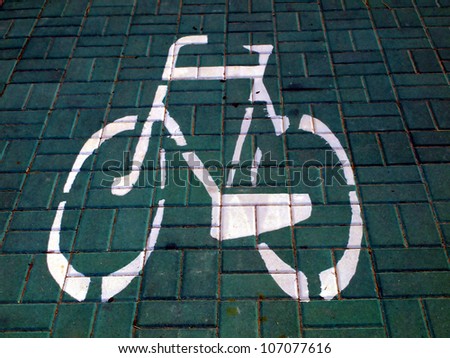way of a separate bicycle path and sidewalk, bike path markings