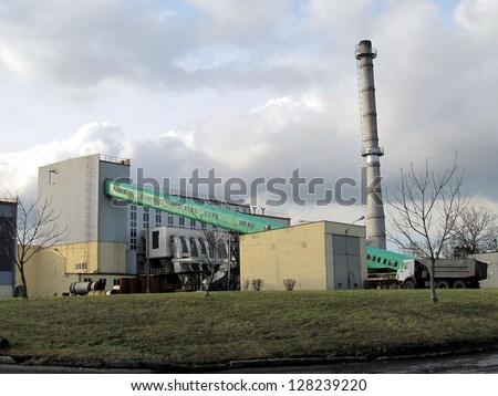 municipal heating plant with visible carbon supply system and flue gas cleaning