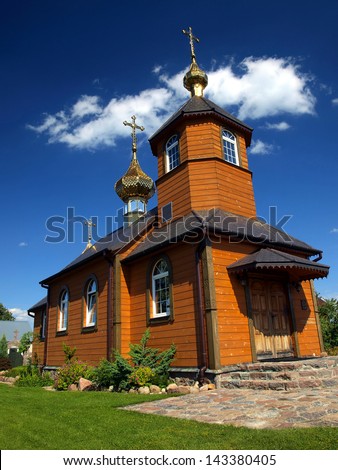 picturesque wooden Orthodox church in the village Kostomloty in eastern Poland on the border with Belarus
