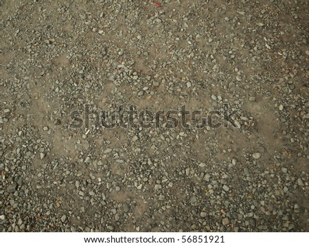 stone as raw material for the construction of roads, streets, sidewalks, and background and texture