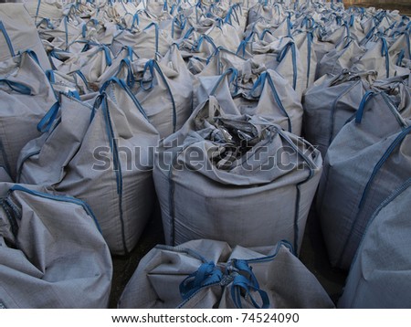 filled with large bags for storage of various materials