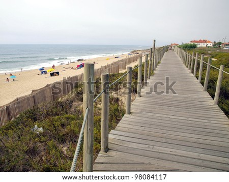 wooden path above the beach, and a fragment of the Atlantic Ocean, Portugal