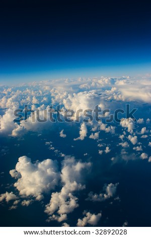 A view of clouds from an airplane window