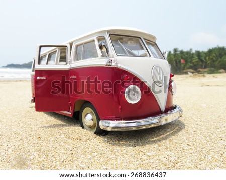 PHUKET, THAILAND - MARCH 27, 2015: Miniature VW Bulli 1962 on the beach. The cult car of the Hippie generation and it remained the status vehicle of the high wave surfers.