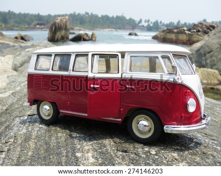 PHUKET, THAILAND - MARCH 27, 2015: Miniature VW Bulli 1962 on the rock. The cult car of the Hippie generation and it remained the status vehicle of the high wave surfers