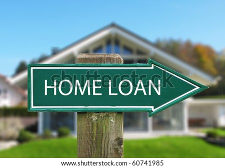 HOME LOAN sign against house