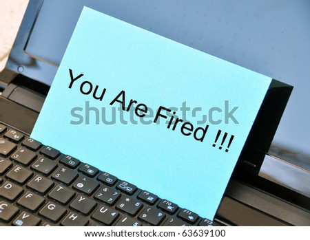 YOU ARE FIRED letter on the laptop