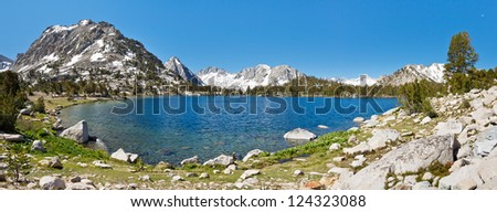 Sierra Nevada Mountain Lake Panorama. Bullfrog Lake and the Kearsarge Pinnacles on a beautiful summer day.