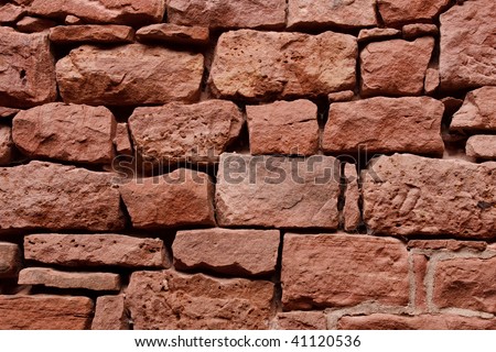 Old Sandstone Wall / Background / Texture. Fortified Wall of a Castle.