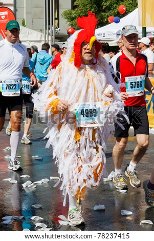 MAINZ, GERMANY - MAY 8: Some runners like to stand out from the crowd at the Gutenberg Marathon on May 8, 2011 in Mainz, Germany. 9,500 runners participate in the event.