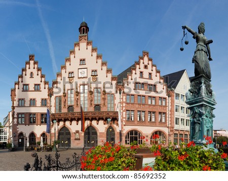 The Roemer at Roemerberg, Frankfurt\'s Town Hall and center of the Old Town. Statue of Lady Justice (Justitia) in the foreground.