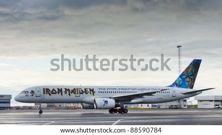 REYKJAVIK, ICELAND - AUG 2: Iron Maiden\'s airplane at the airport in Reykjavik, Iceland, on August 2, 2011 during the band\'s World Tour 2011. The uniquely painted airplane is known as Ed Force One.