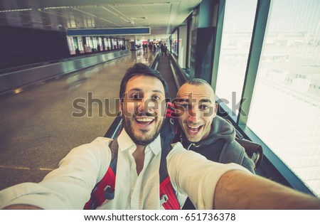 friends In Airport Lounge Near Windows Happy Smile  Friends Taking Selfie Photo before Flight around the world