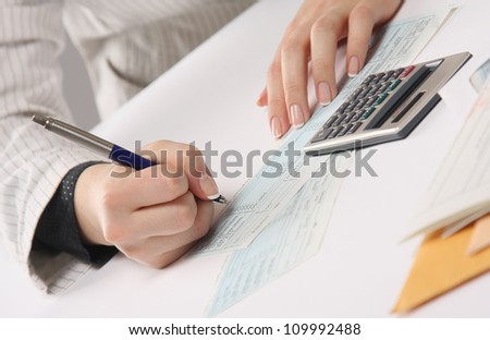Business woman working with tax documents