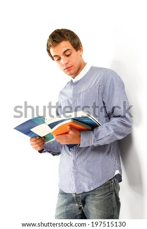 young college guy with books