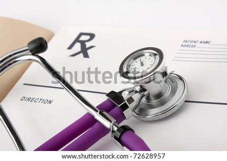 Closeup of a stethoscope on a medical record