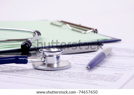 billing statement. stock photo : Stethoscope on medical illing statement on table,