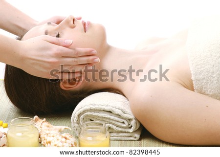 Lifestyle - Pagina 3 Stock-photo-a-woman-getting-a-face-massage-isolated-on-white-82398445