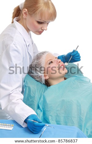 Dentist Examining Teeth